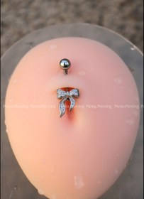 تصویر پیرسینگ ناف پاپیون ۳ 