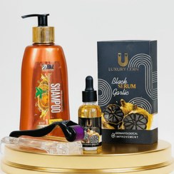 تصویر پک رشد مو سرم سیر سیاه لاکچری کوین + شامپو تخصصی + غلتک درمارولر 