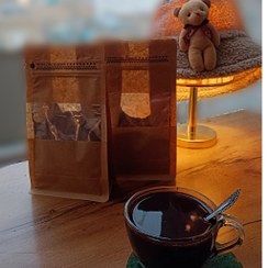 تصویر هات چاکلت غلیظ داخل ظرف شیشه ای 