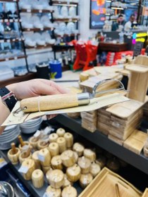 تصویر پوست کن دسته چوب HIGH 