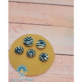 تصویر دکمه دست ساز سرامیکی 