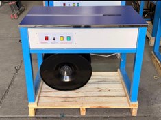 تصویر تسمه‌کش نیمه اتومات میزی مارک جکسون | دستگاه بسته‌بندی کارتن و جعبه Jackson Semi-Automatic Table Strapping Machine | Carton Strapper