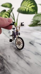 تصویر ماکت دوچرخه BMX فلزی مشکی و بنفش 