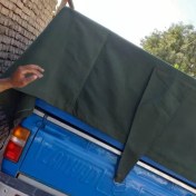 تصویر چادر خودرو نیسان برزنت با دو ردیف قلاب و دم اسبی 