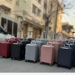 تصویر چمدان مسافرتی سه تکه کارینا با چرخ و بدنه نشکن 