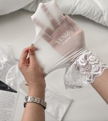 تصویر جوراب بادکنکی سفید بالای زانو 