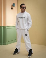 تصویر ست اسپرت دورس و شلوار بگ essentials رنگ مشکی و سفید 