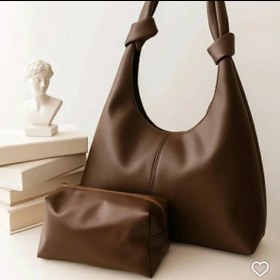 تصویر کیف زنانه چرمی مدل گره‌ای 