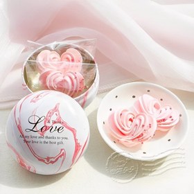 تصویر قوطی فلزی دایره‌ای طرح مرمری 