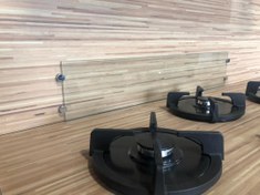 تصویر شیشه محافظ پشت گاز 