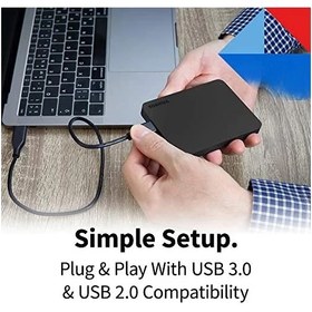 تصویر هارد اکسترنال قابل حمل برند توشیبا با ظرفیت 2 ترابایت Toshiba brand portable external hard drive with a capacity of 2 TB