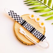 تصویر دستبند طرح چفیه دستبافت 