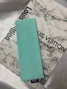 تصویر هدبند ورزشی - فیروزه ای 