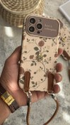 تصویر قاب موبایل ( آیفون ) گل رز فلورا قهوه ای + بندست چرمی 