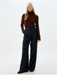 تصویر بلوز بافت یقه اسکی آستین بلند و دکمه‌دار در سرآستین‌ زنانه کوتون Koton 