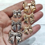 تصویر دکمه دفرمه طرح پاپیون دنباله دار(سه سایز) 