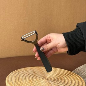 تصویر پوست کن شنگیا مشکی 