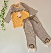 تصویر بلوز و شلوار نوزادی پنبه نیلی طرح شیر - یک 