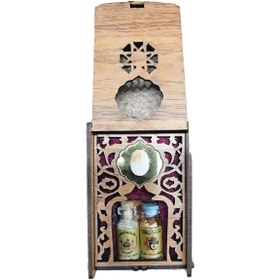 تصویر سنگ حرم امام حسین (ع) به همراه آب سرداب حرم حضرت عباس (ع) و تربت کربلا 