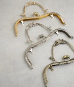 تصویر دهانه کیف فلزی مدل کمان گلدار 