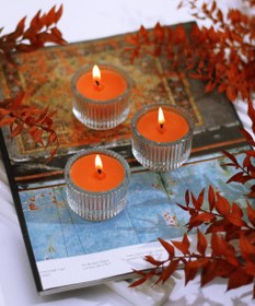 تصویر شمع لیوانی کوچک نارنجی 