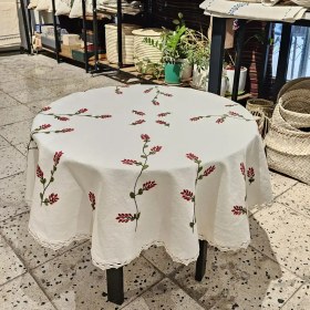 تصویر رومیزی گرد گلدوزی زرشک کوچک 