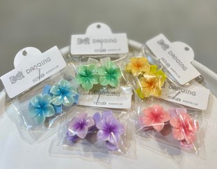 تصویر گیره‌ی سر زنانه طرح گل 