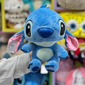 تصویر عروسک استیج نشسته 