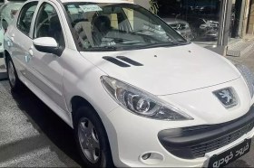 تصویر پژو 207 پانوراما اتوماتیک TU5 سفید صفر کیلومتر ا Peugeot 207 AT Panorama Peugeot 207 AT Panorama