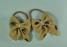 تصویر کش مو دخترانه پاپیونی خالدار 