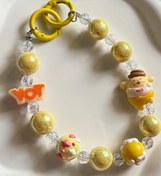 تصویر آویز موبایل نارنجی زرد صورتی 