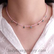 تصویر گردنبند منجوقی صورتی با آویز چشم نظر 