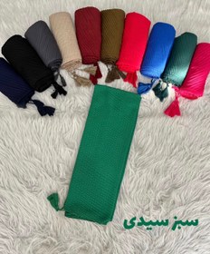 تصویر شال پلیسه نخی منگوله دار در رنگ های سرخابی؛گوجه ای؛سبز پررنگ؛سبز سیدی؛سبز زیتونی؛زرشکی؛کرم؛سورمه ای؛نوک مدادی؛آبی کاربنی؛مشکی 