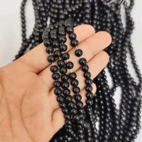 تصویر مروارید سنگی مشکی سایز 6میل 