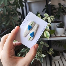 تصویر گیره مو گل آبی 