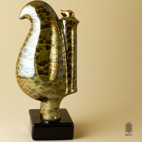 تصویر تندیس سرامیکی مرغ هما لعاب ترکدار سبز سدری
