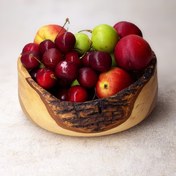 تصویر کاسه چوبی دفُرمه و لبه پوستی 