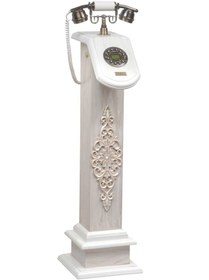 تصویر تلفن سلطنتی ایستاده کنارسالنی سفید استخوانی 