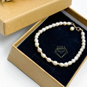 تصویر ست گردنبند دستبند مروارید و طلا 