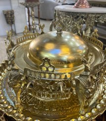 تصویر منقل و سینی برنجی پایه طرح شیر ریخته سنگین 