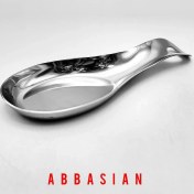 تصویر زیر قاشق کنار گاز استیل 