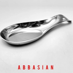 تصویر زیر قاشق کنار گاز استیل 