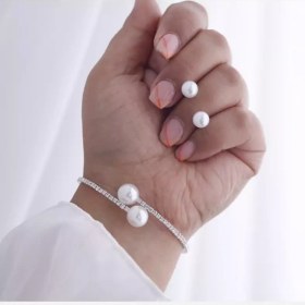 تصویر ست بدلیجات تنیسی مروارید 