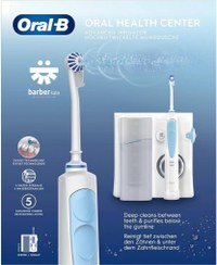 تصویر واتر جت دندان اورال-بی مدل Oral Health Center با مخزن بزرگ و عملکرد برقی 