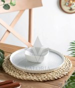 تصویر زیر بشقابی حصیری گرد ایکیا مدل والریا 