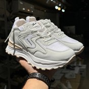 تصویر کتانی زنانه ریباک مدل واریور با رویه جیر 