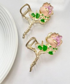 تصویر کلیپس فلزی گل صورتی 