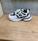 تصویر کتانی نیوبالانس بچگانه با زیره پی یو - سفید / ۳۴ 