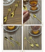 تصویر قاشق چایخوری طلایی لوکس – مناسب پذیرایی و استفاده روزانه 