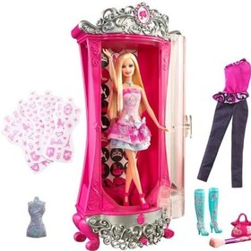 تصویر مجموعه اسباب بازی باربی همراه با لباسهای پرزرق و برق محصول Barbie. 